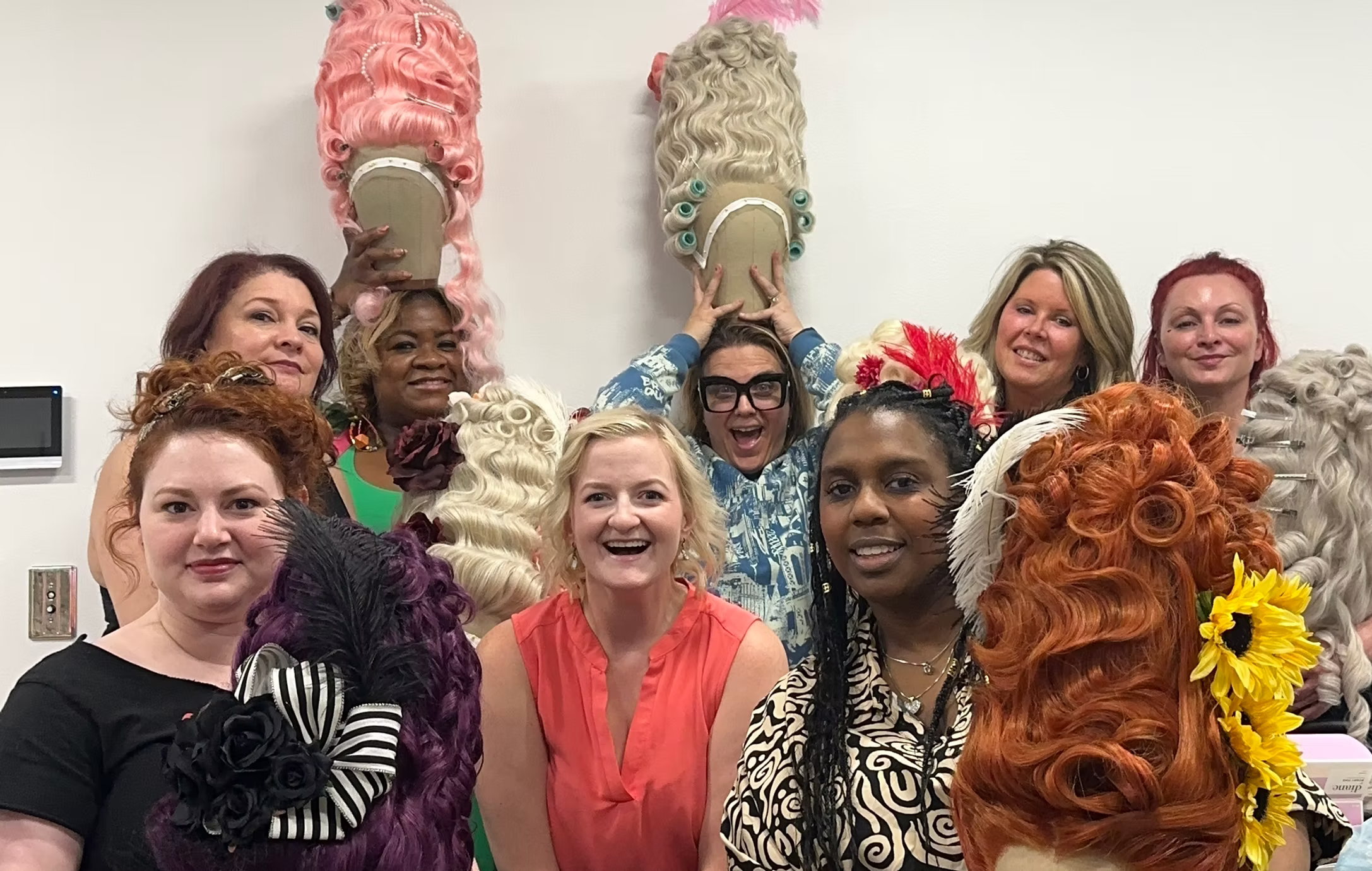 Annie Hardt and participants at The Caged Wig