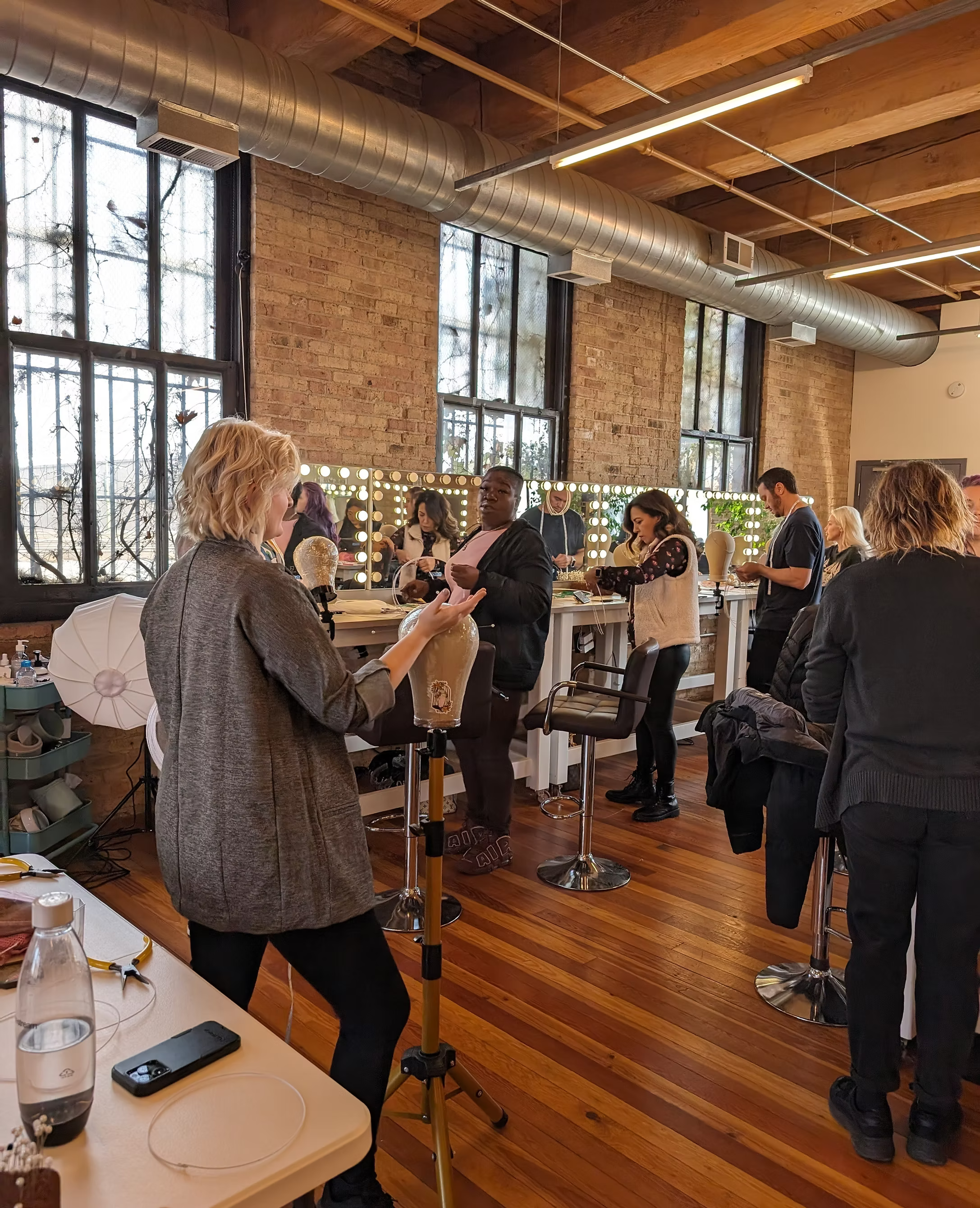 Annie Hardt instructing a class at The Caged Wig