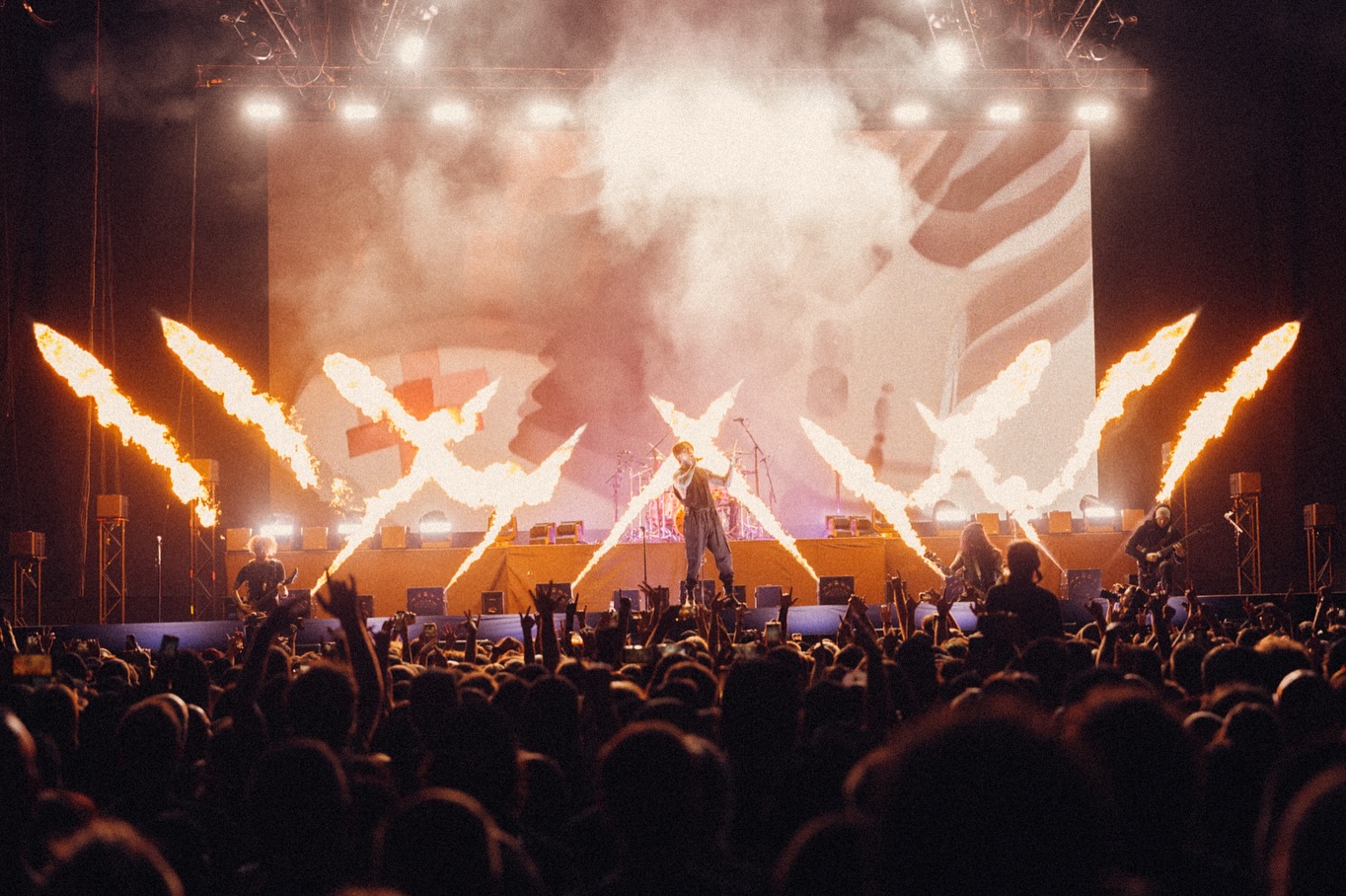 Falling in Reverse performing on stage at their concert featuring CHAUVET.