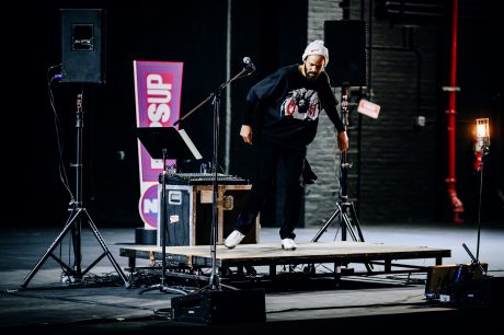 Savion Glover performing on stage