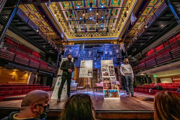 stop on architecture tour two people on stage