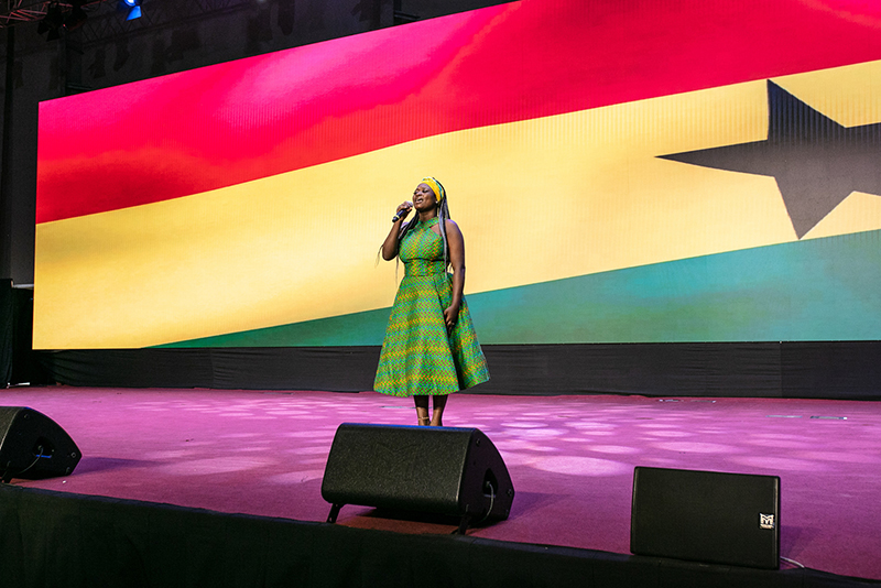 Person preforming on stage in Ghana with Martin sound system